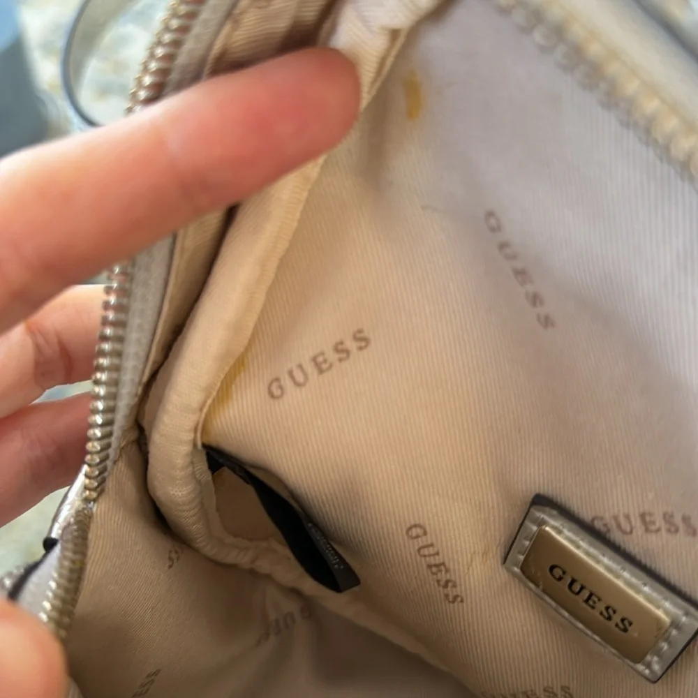 Guess silver mini backpack